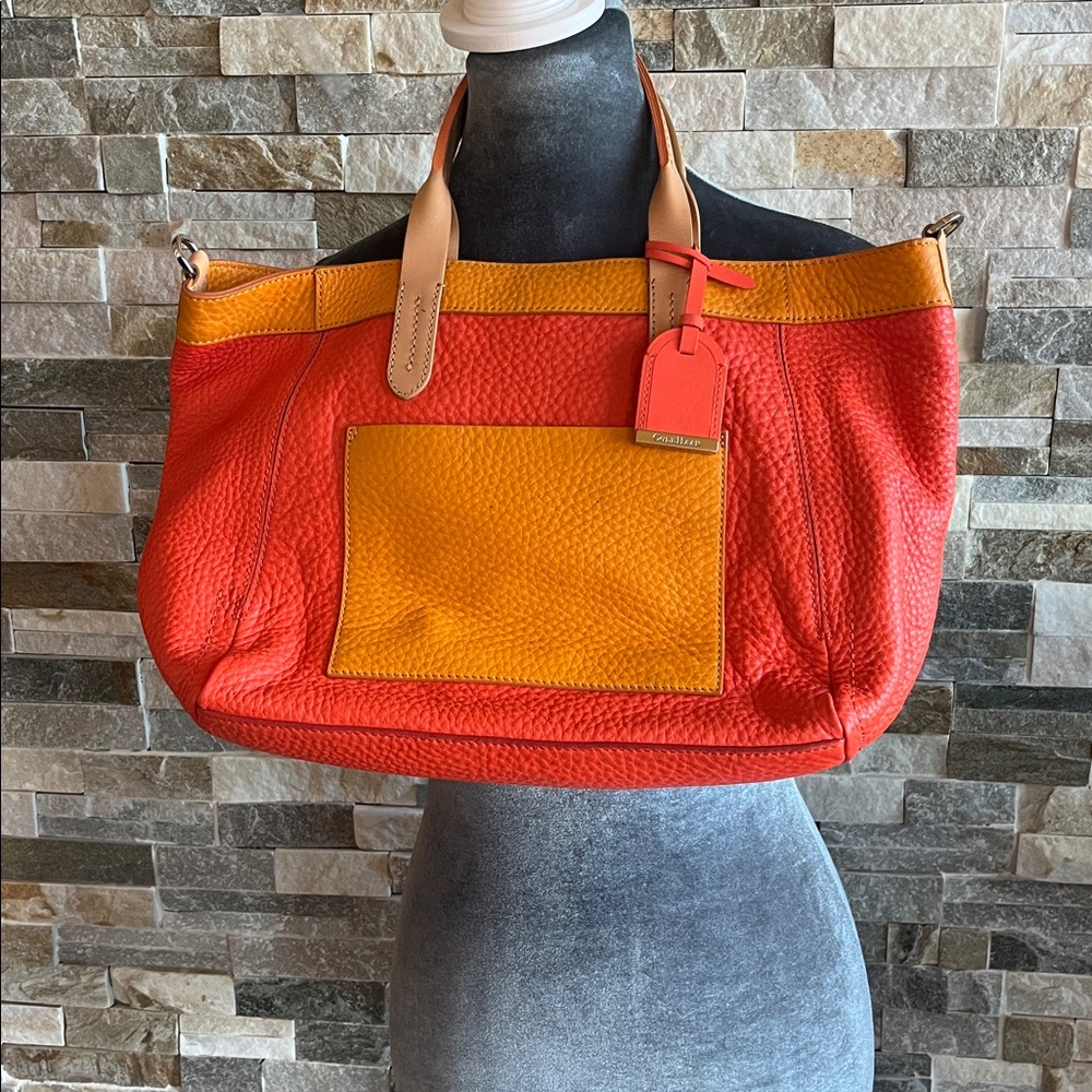 Cole Haam Yellow and Orange Leather 
It doesn’t have shoulder strap